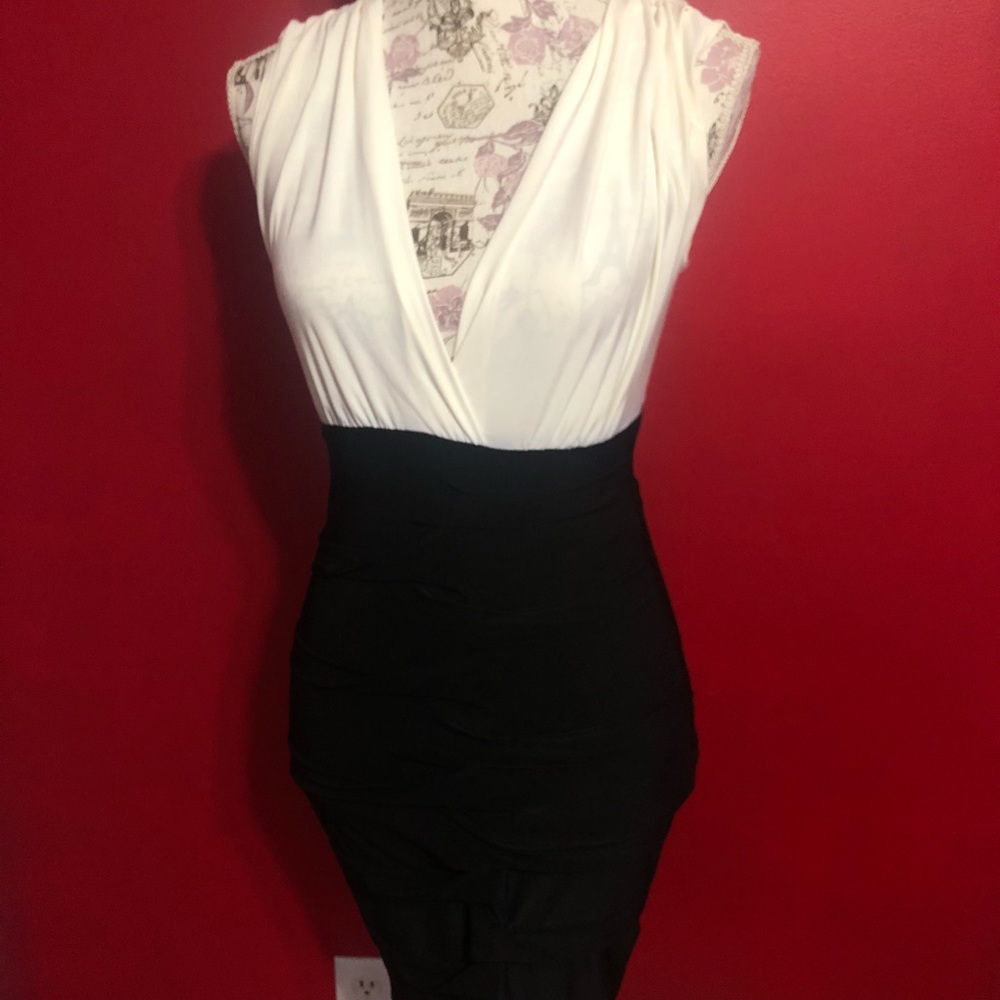 Black and white sleeveless dress.